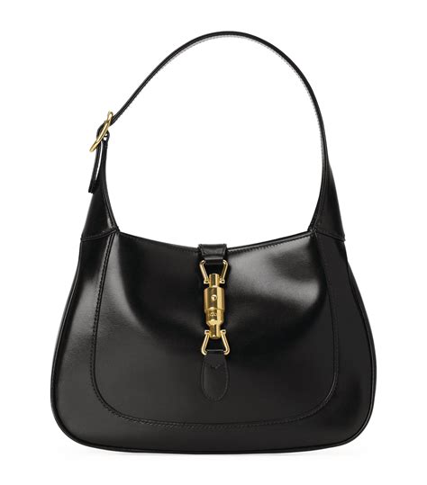 Jackie 1961 small shoulder bag in black shearling 